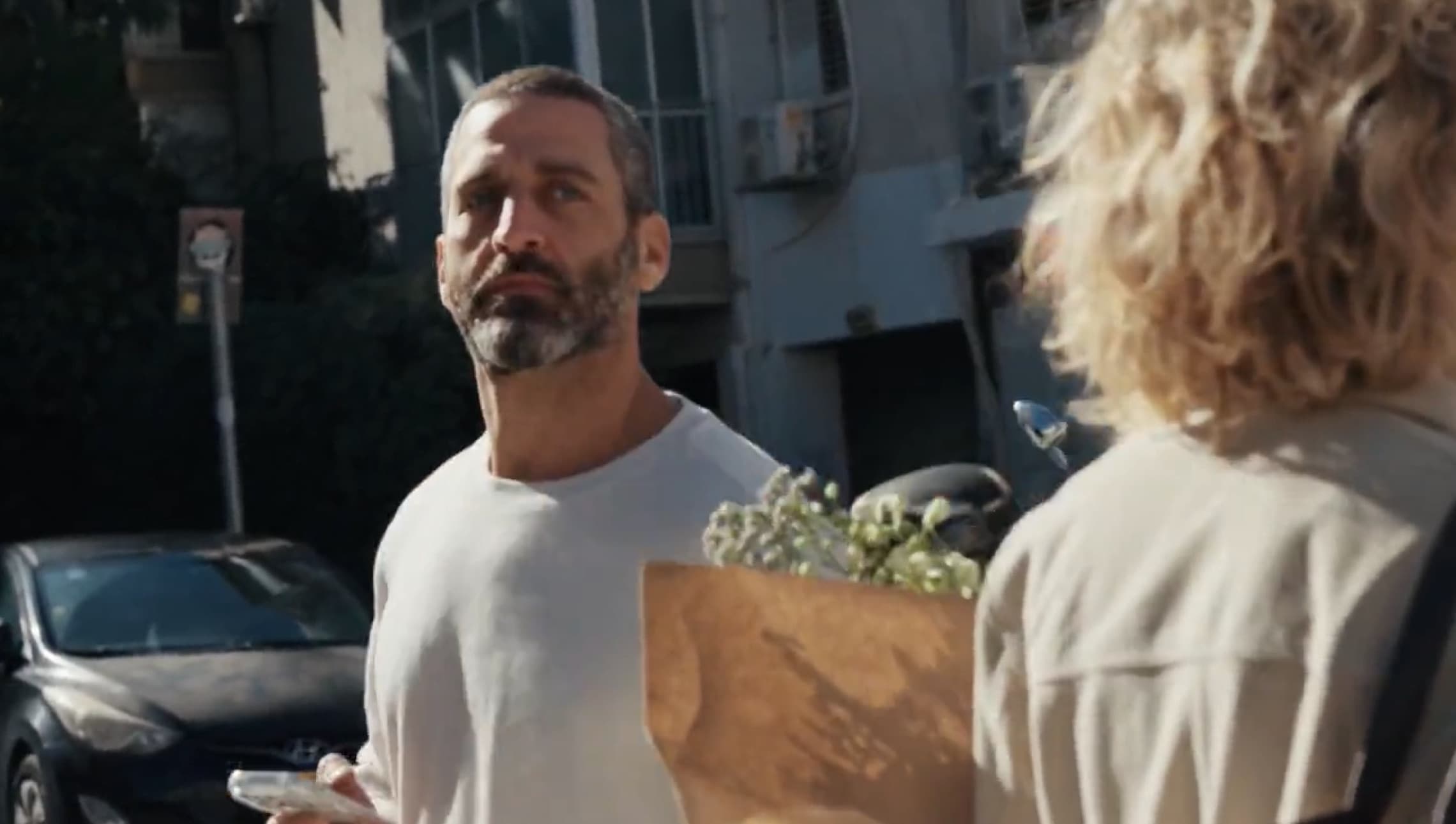 OF/WHITE — a Tel Aviv street, the opening of the film